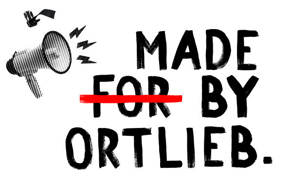 Graphic with a megaphone and bold text 'Made by ORTLIEB,' with 'for' crossed out in red, emphasizing ORTLIEB's commitment to making its own products.
